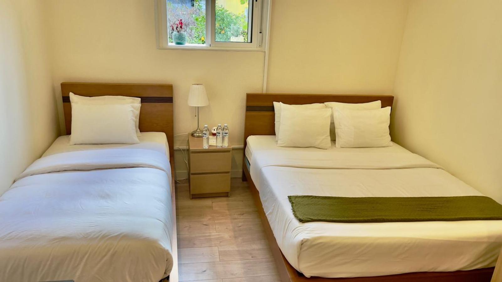 Habitación Triple Básica con baño compartido